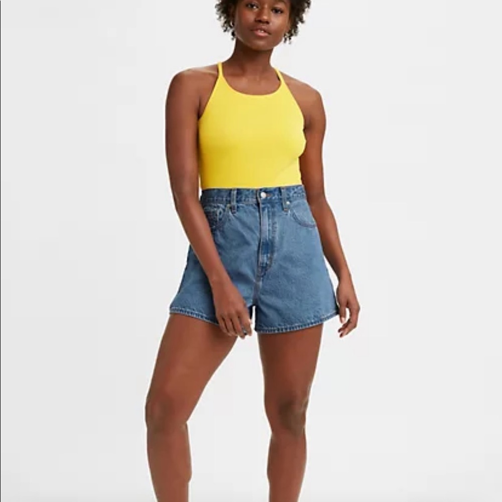 Vintage Levi’s 550 Mid Thigh Medium Wash Denim Shorts
